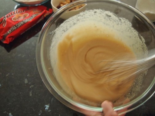 Whisking brown sugar and eggs